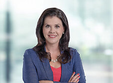 Julia Hilliker on light blue and white bokeh banner