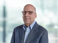 Joseph Goldberg on white bokeh background
